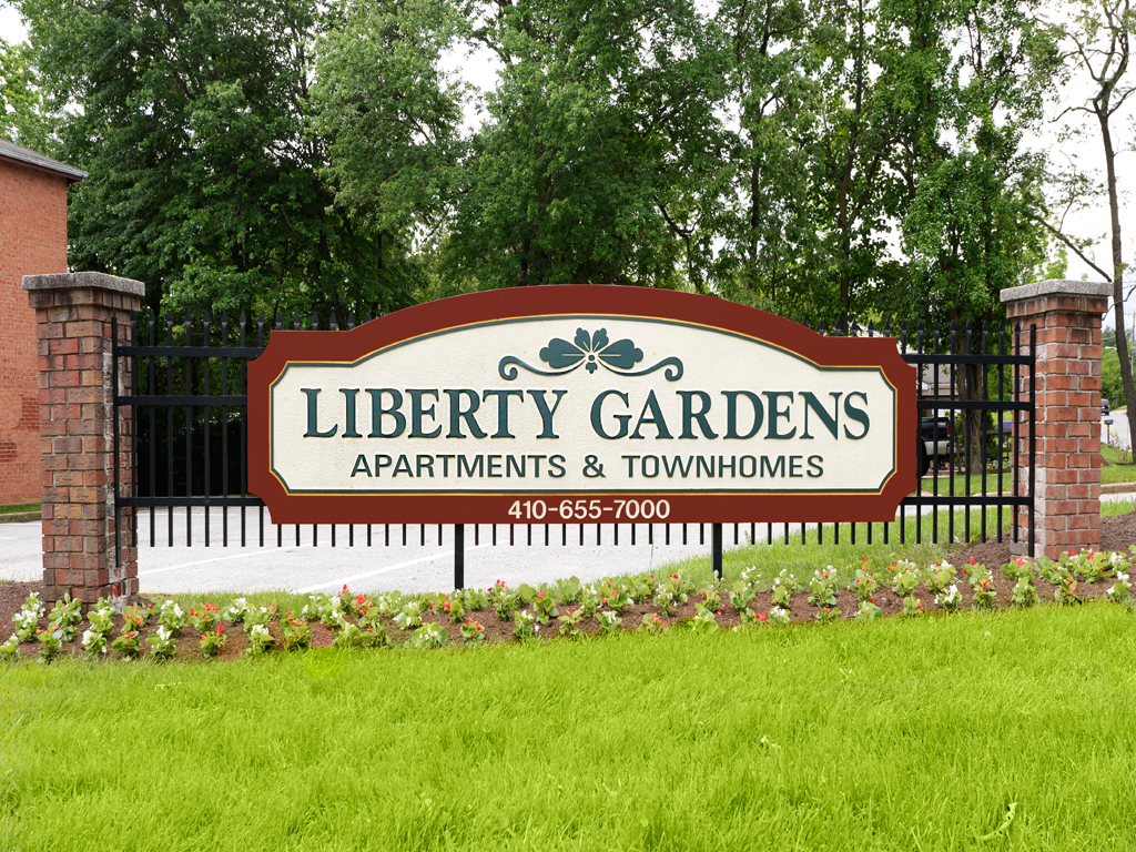 a sign that says liberty gardens apartments and townhomes at Liberty Gardens Apartments, Maryland